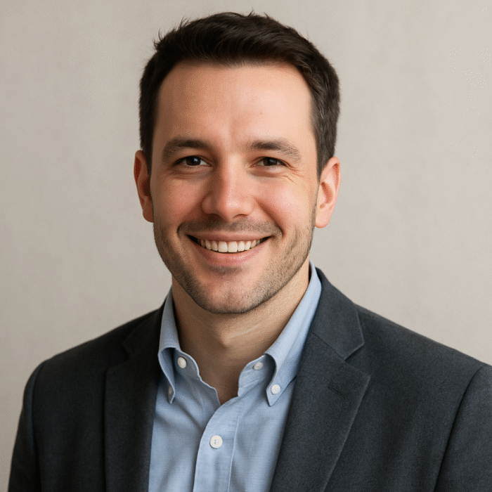 20250909 1212 Smiling Professional Headshot simple compose 01k4pzcj9we4j82m2jk82tbpyg